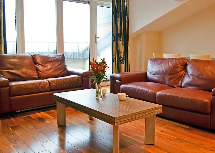Carrick Plaza Suites And Apartments